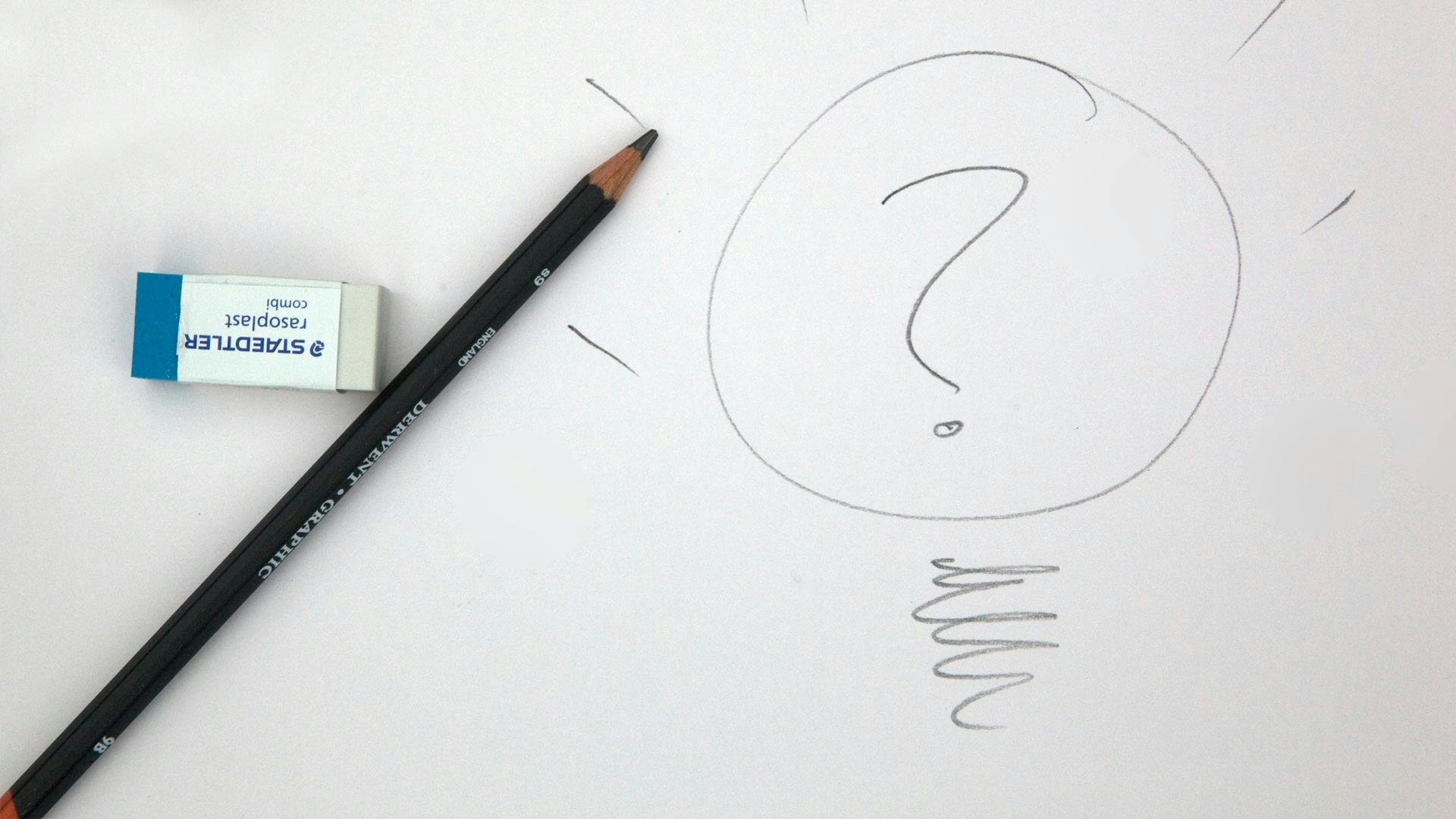 Question Mark Drawn on White Paper